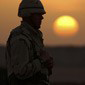 Soldier in setting sun